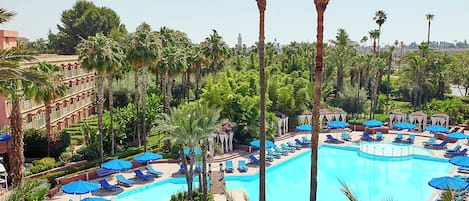 2 outdoor pools, open 9:00 AM to 7:00 PM, pool umbrellas, pool loungers