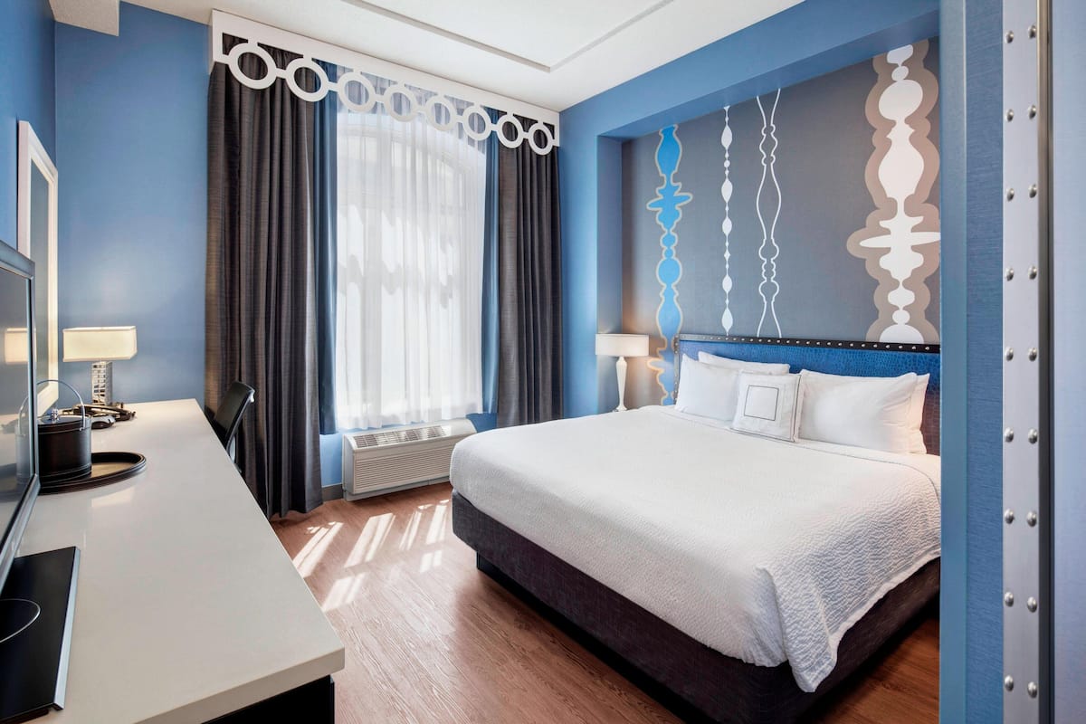 pillow-top beds, desk, blackout curtains, iron/ironing board