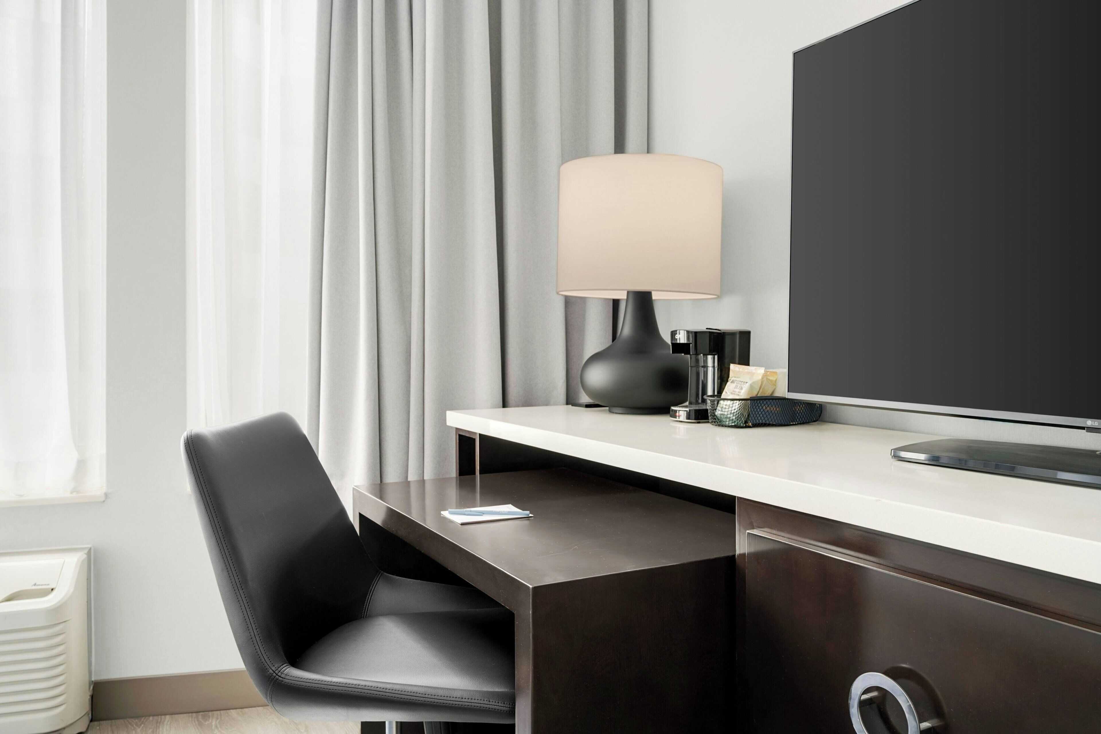 Pillowtop beds, desk, blackout drapes, iron/ironing board