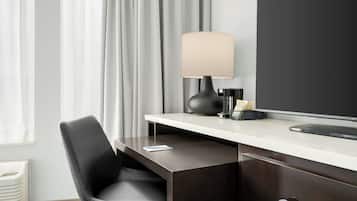 Pillowtop beds, desk, blackout drapes, iron/ironing board