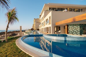 Outdoor pool, open 8:00 AM to 10:00 PM, pool umbrellas, sun loungers