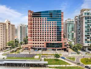 A high-rise hotel with a modern glass facade, named 'Grand Mercure Roxy Hotel,' located at Roxy Square. - Grand Mercure Singapore Roxy (Singapore)