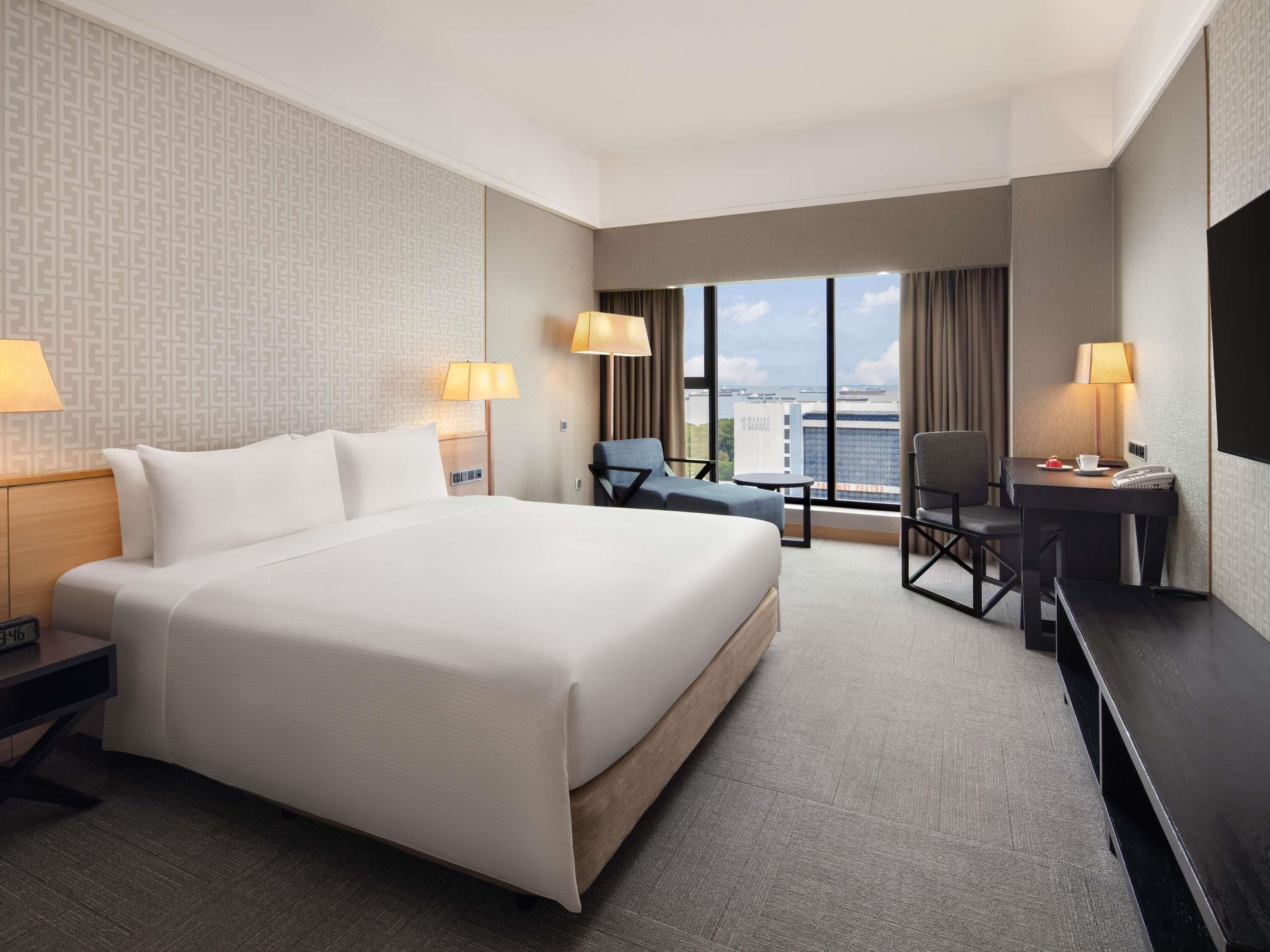 行政客房, 1 张特大床 | 客房内保险箱、办公桌、遮光窗帘、熨斗/熨衣板