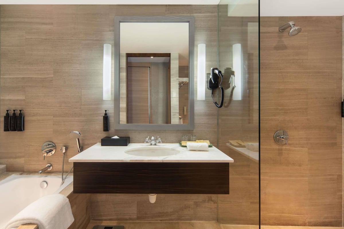 junior suite, 1 king bed | 1 bedroom, in-room safe, desk, blackout curtains