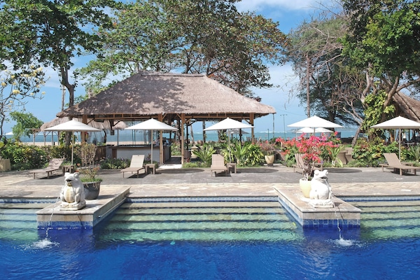 2 outdoor pools, open 7:00 AM to 6:00 PM, pool umbrellas, pool loungers