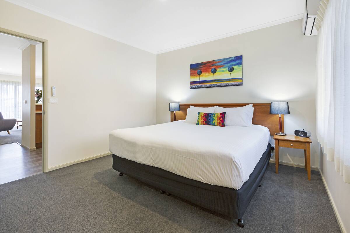 Minibar, desk, laptop workspace, iron/ironing board
