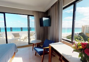 Family Suite with Terrace Ocean Front | Minibar, in-room safe, desk, laptop workspace
