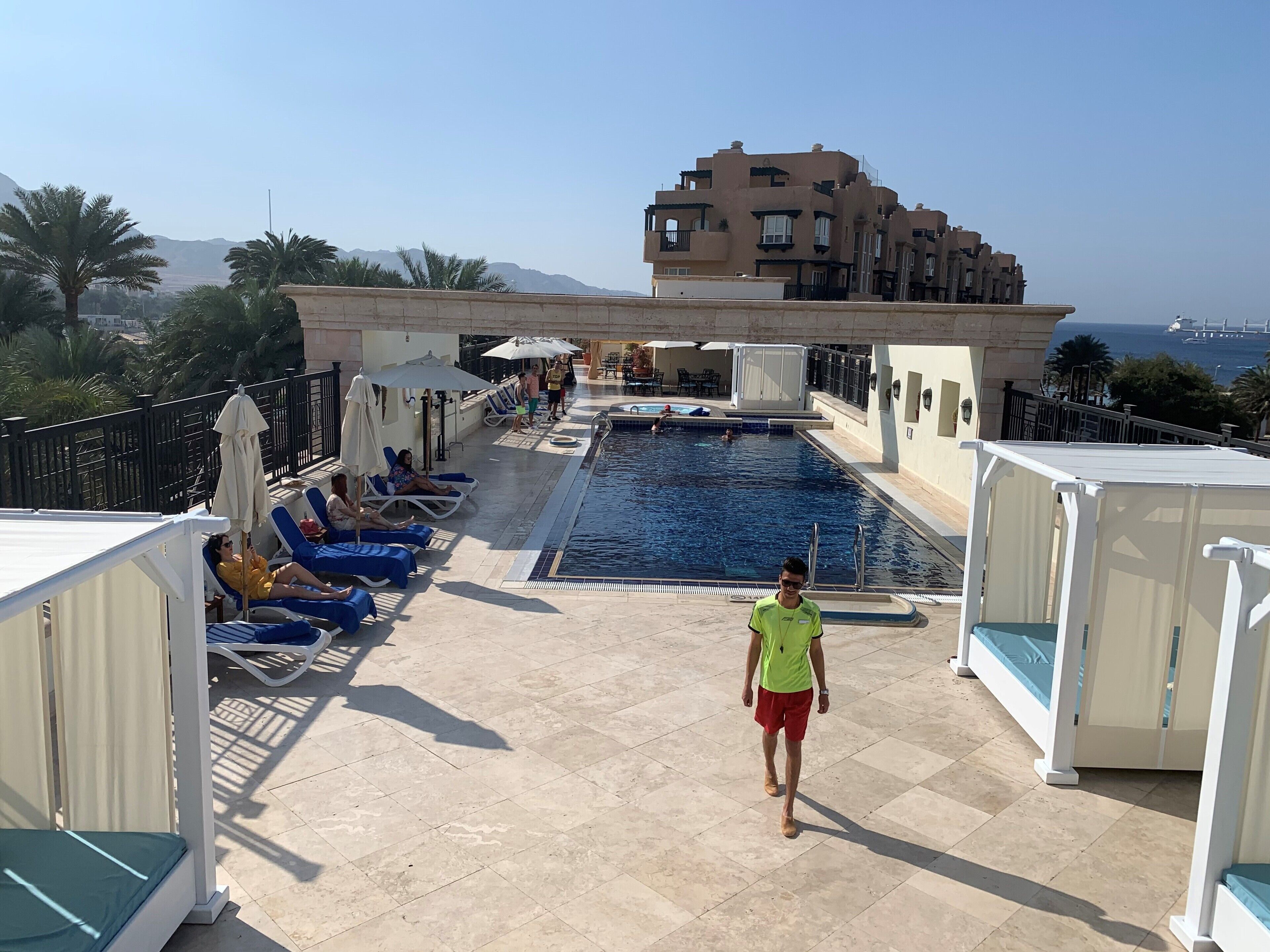 4 outdoor pools, open 8:00 AM to 7:00 PM, pool umbrellas, sun loungers