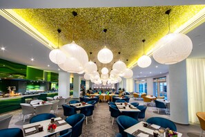 4 restaurants, breakfast, lunch, dinner served; international cuisine