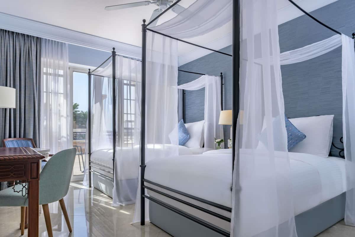 Executive Suite, Sea View | In-room safe, desk, laptop workspace, blackout drapes