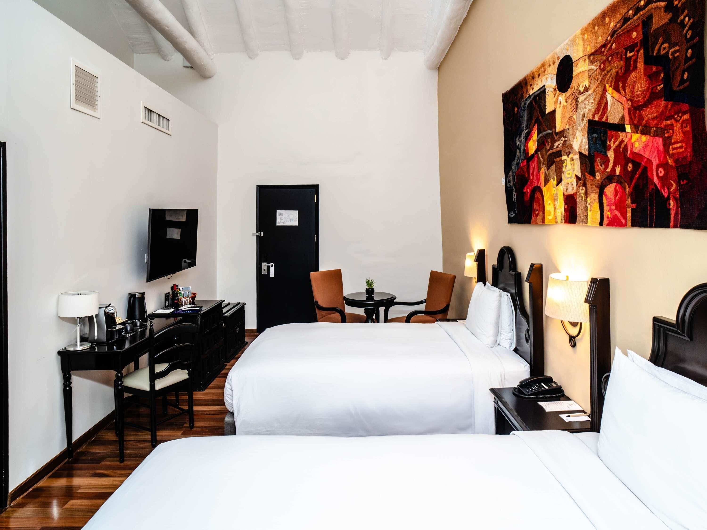 Room, 2 Twin Beds (Colonial) | Minibar, in-room safe, desk, iron/ironing board