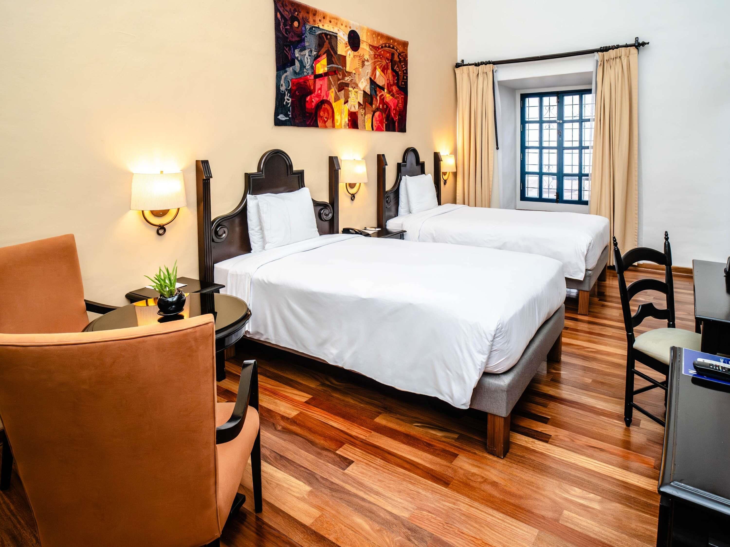 room, 2 single beds (colonial) | minibar, in-room safe, desk, iron/ironing board