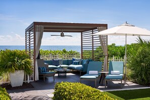 On the beach, beach cabanas, sun loungers, beach umbrellas