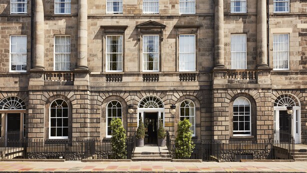 A historic building with a symmetrical facade, large windows, and a central entrance with steps. - Kimpton Charlotte Square by IHG (Edinburgh)