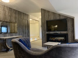 Suíte luxo | Área de estar | TV 32 polegadas com canais digitais