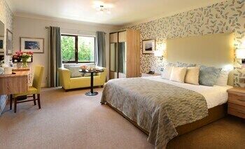 Premium bedding, desk, blackout drapes, iron/ironing board