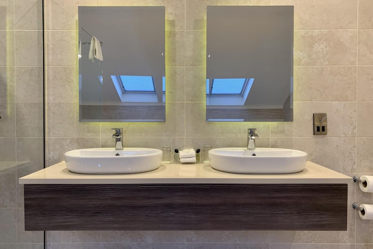 junior studio suite | bathroom | free toiletries, hair dryer, soap, shampoo