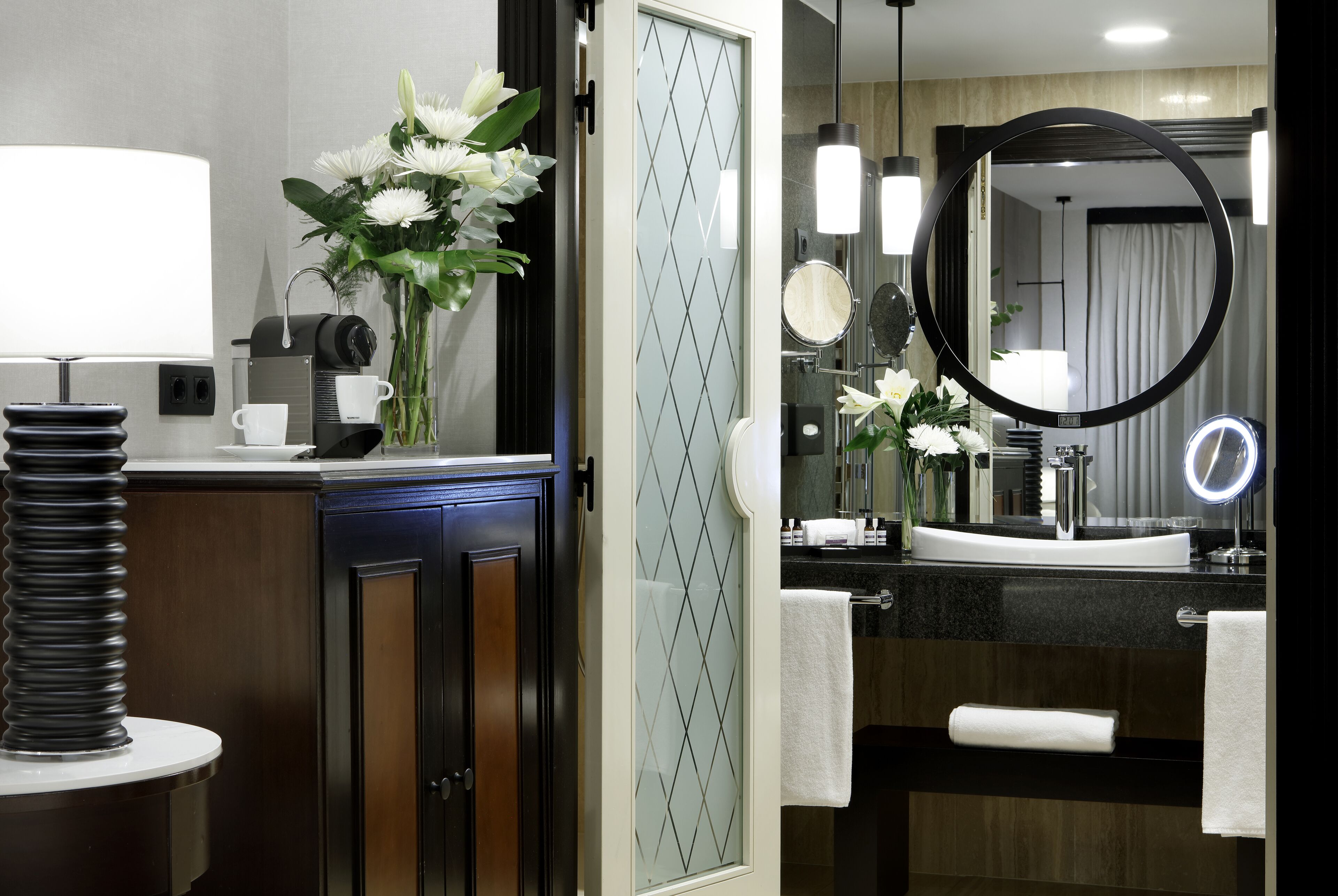 designer toiletries, hair dryer, bathrobes, slippers