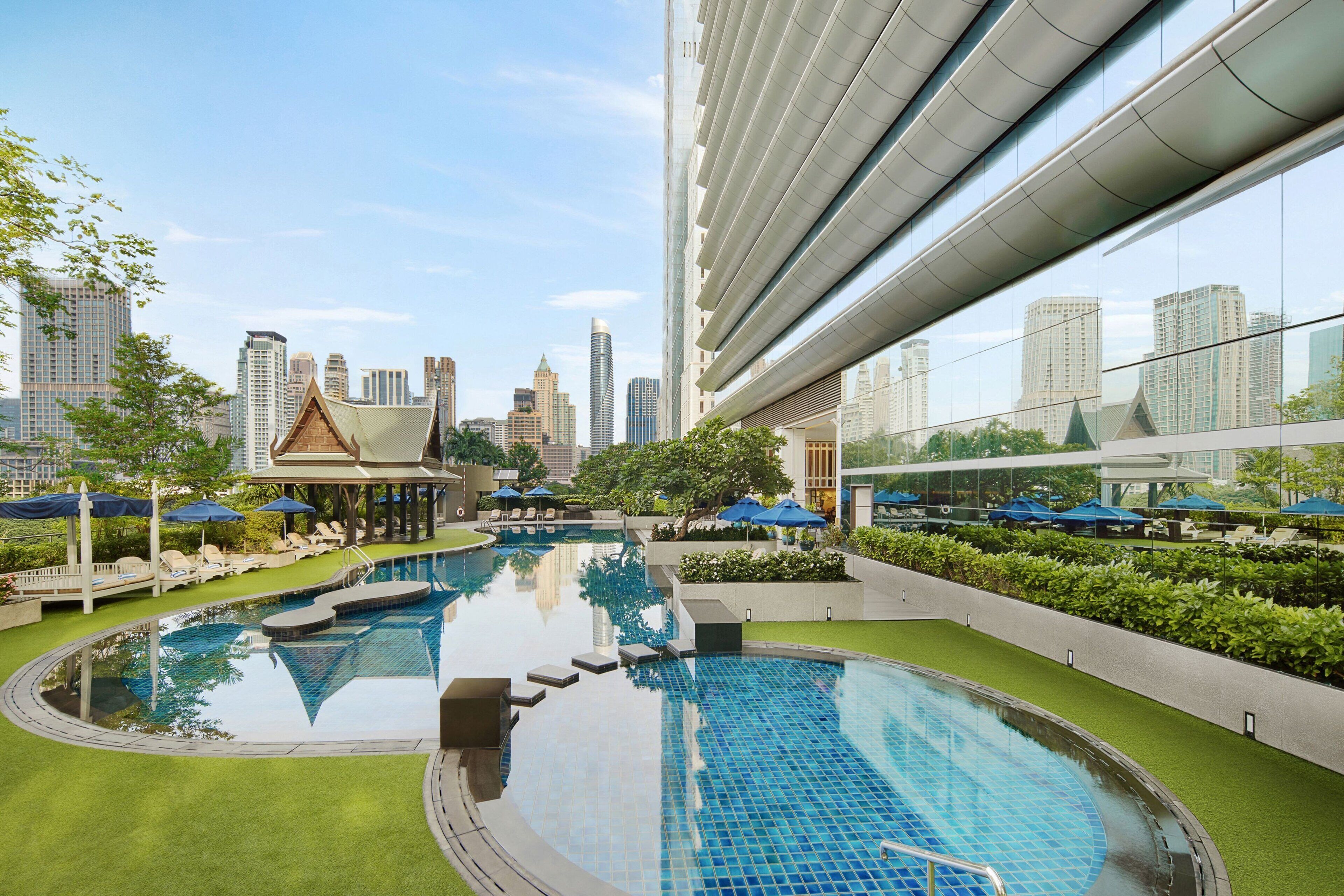 Outdoor pool, free pool cabanas, pool umbrellas