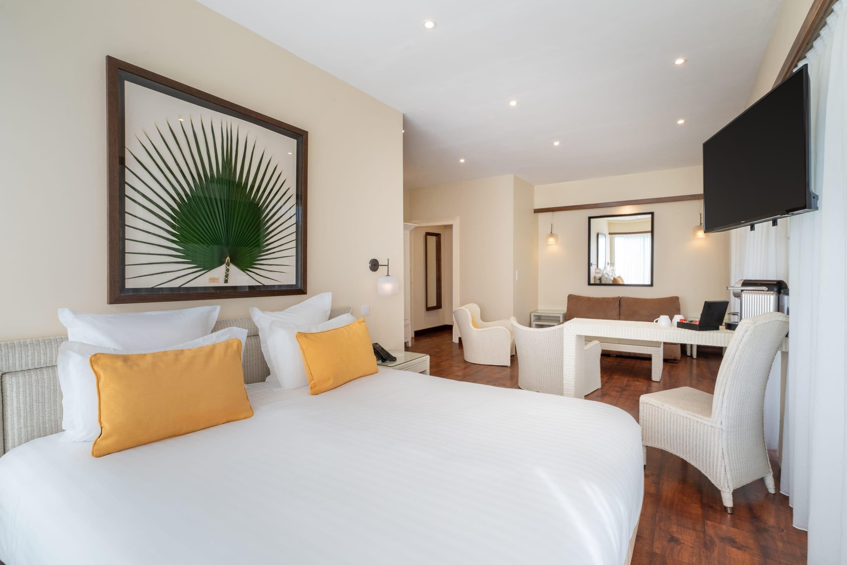 Premium bedding, pillow-top beds, minibar, in-room safe