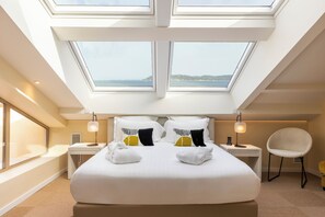 Ropa de cama de alta calidad, colchones con pillow-top y minibar 