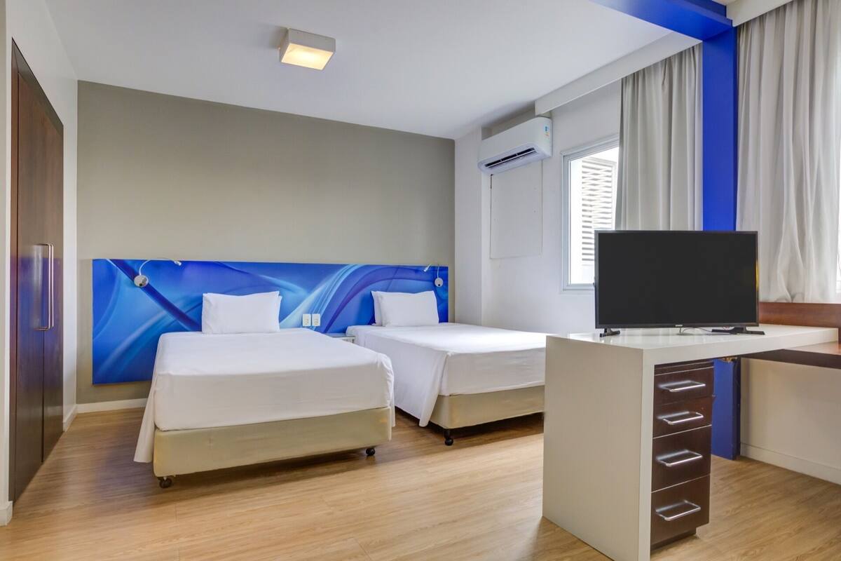 Suite ejecutiva, 2 camas individuales, no fumadores | Minibar, caja fuerte, escritorio y cortinas opacas