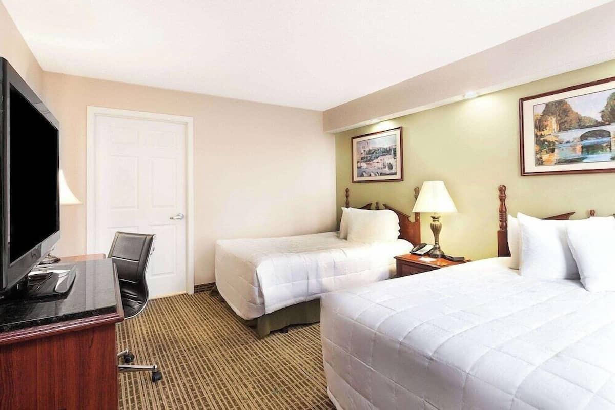 Pillow-top beds, desk, laptop workspace, blackout curtains