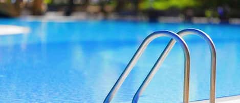 Seasonal outdoor pool, open 10 AM to 10 PM, sun loungers