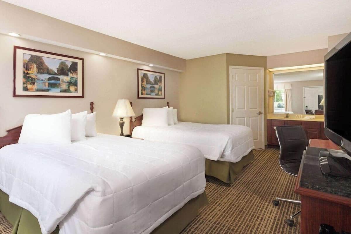 Pillow-top beds, desk, laptop workspace, blackout curtains