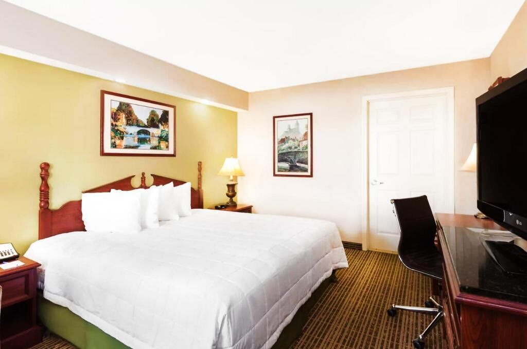 Pillow-top beds, desk, laptop workspace, blackout curtains