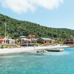 On the beach, white sand, free beach cabanas, sun loungers
