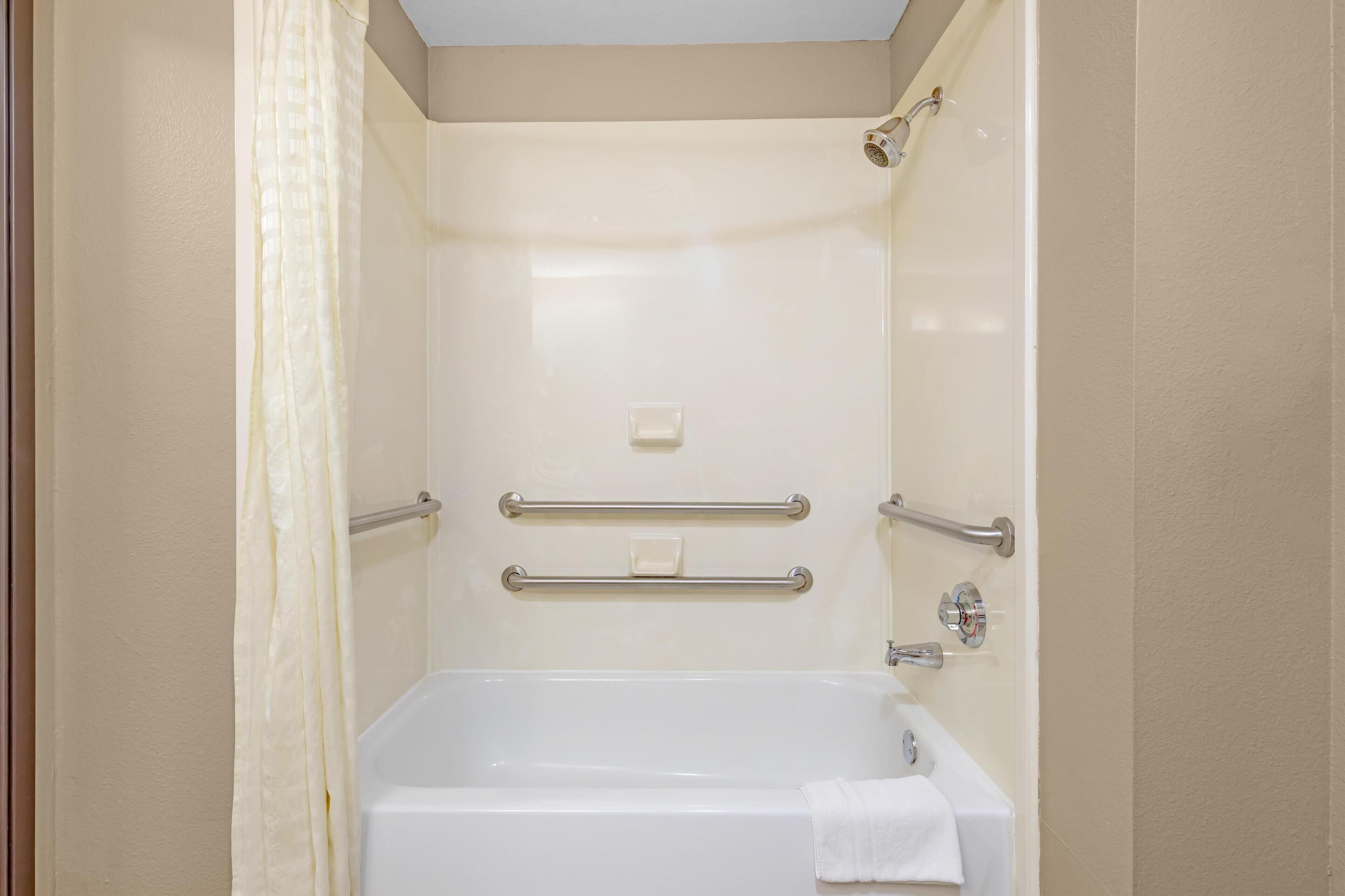 combined shower/bathtub, free toiletries, hair dryer, towels