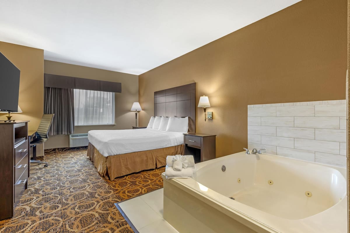 Chambre Standard, 1 très grand lit, non-fumeurs, baignoire à jets | Bureau, fer et planche à repasser, Wi-Fi gratuit, draps fournis