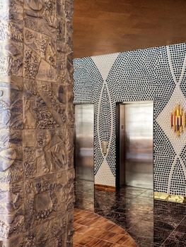 Premium bedding, in-room safe, blackout drapes, iron/ironing board at The Manner, The Unbound Collection by Hyatt