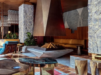 Premium bedding, in-room safe, blackout drapes, iron/ironing board at The Manner, The Unbound Collection by Hyatt