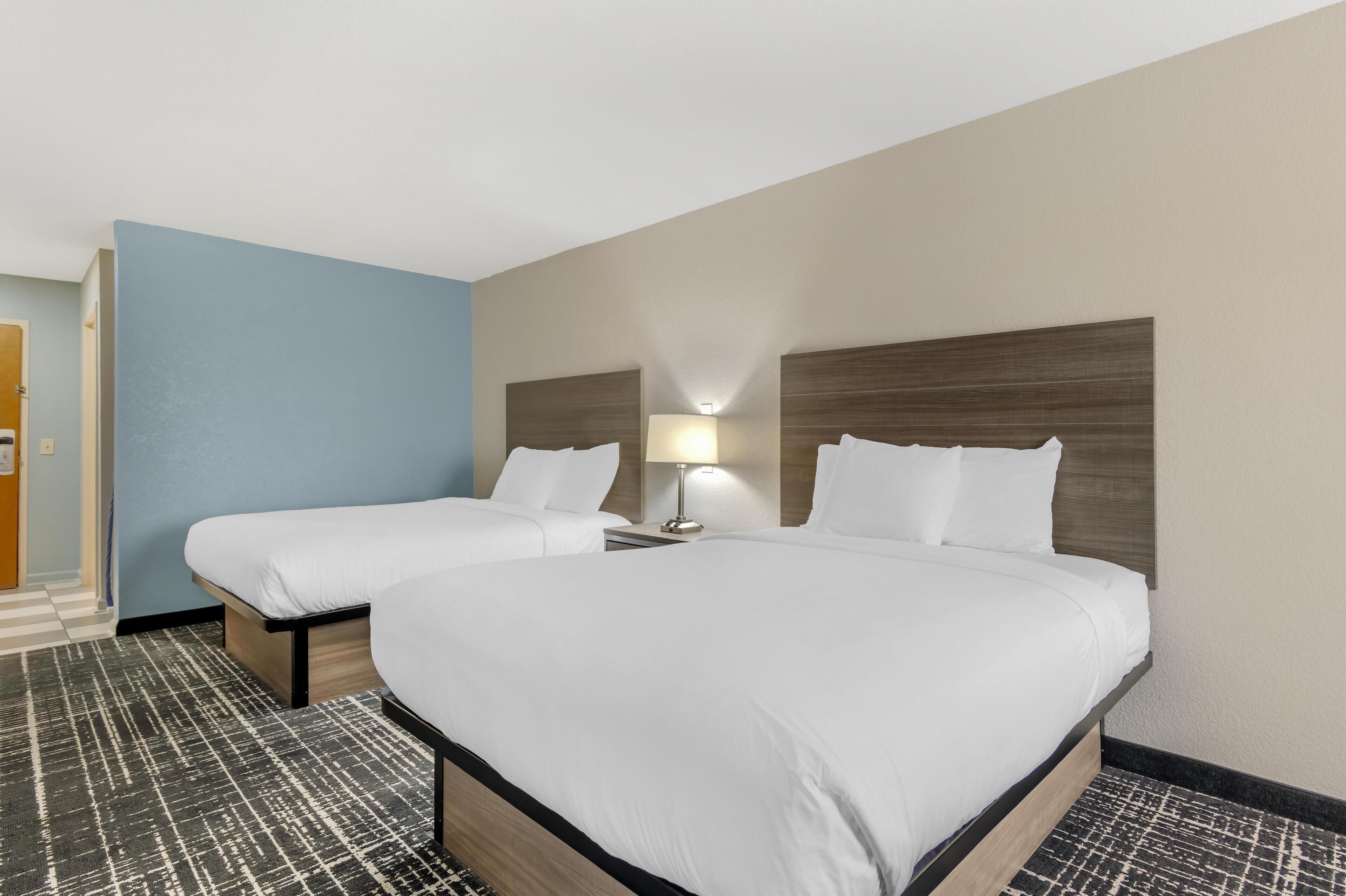 standard room, 2 queen beds, non smoking, refrigerator & microwave | pillow-top beds, desk, laptop workspace, iron/ironing board