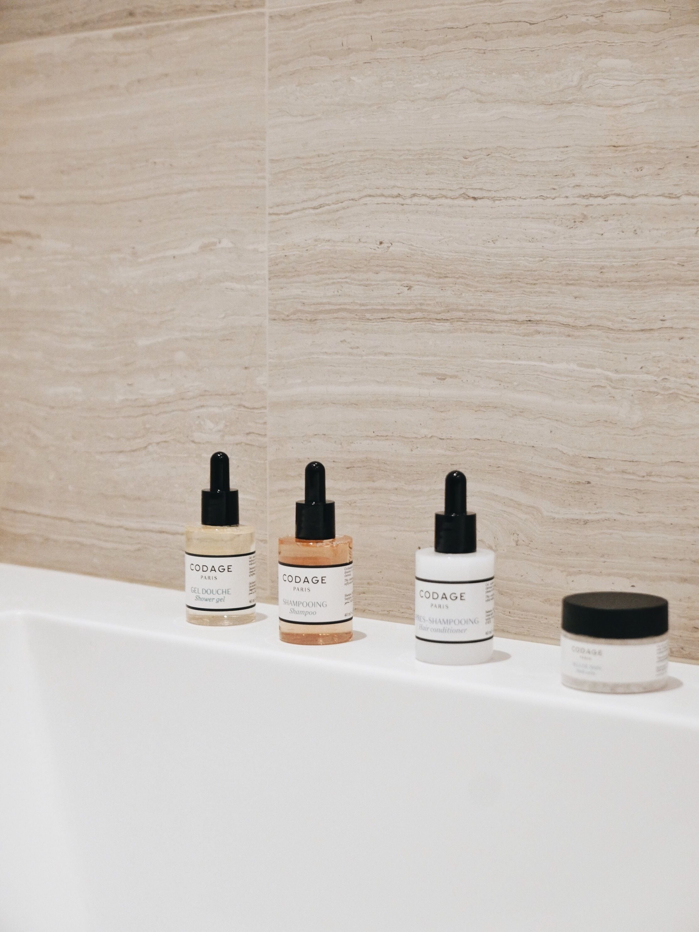 shower, rainfall showerhead, designer toiletries, hair dryer