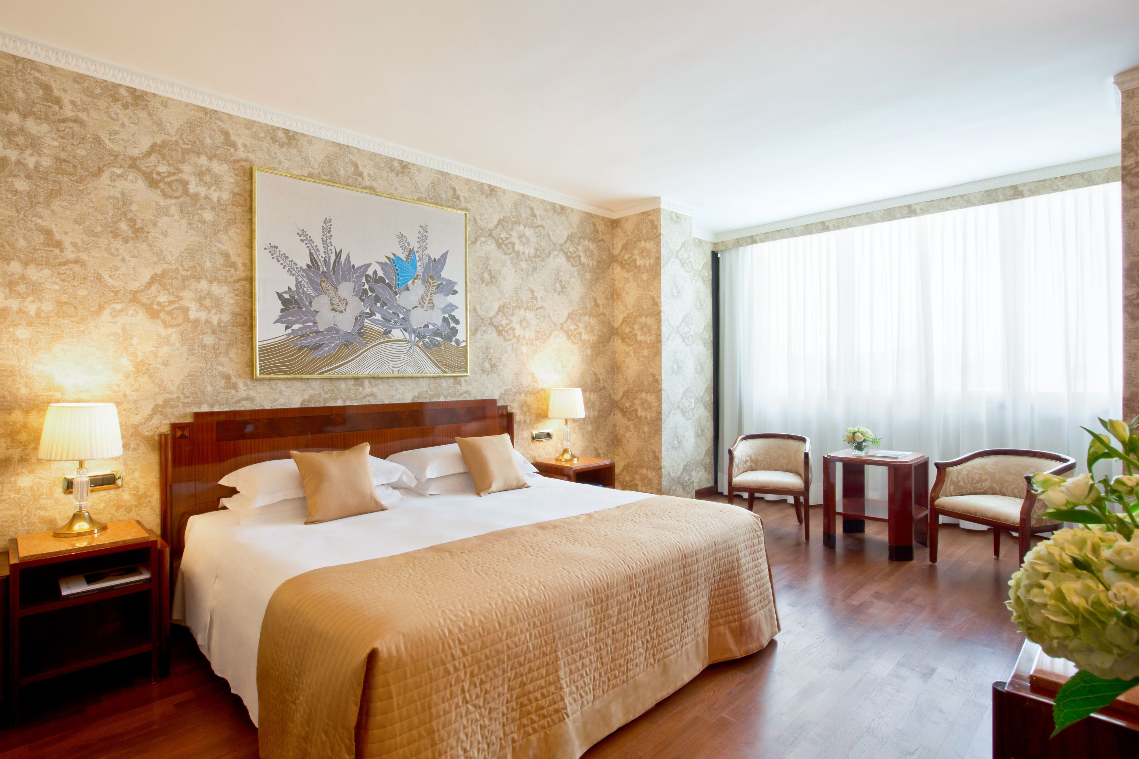 deluxe double room | premium bedding, minibar, in-room safe, individually decorated