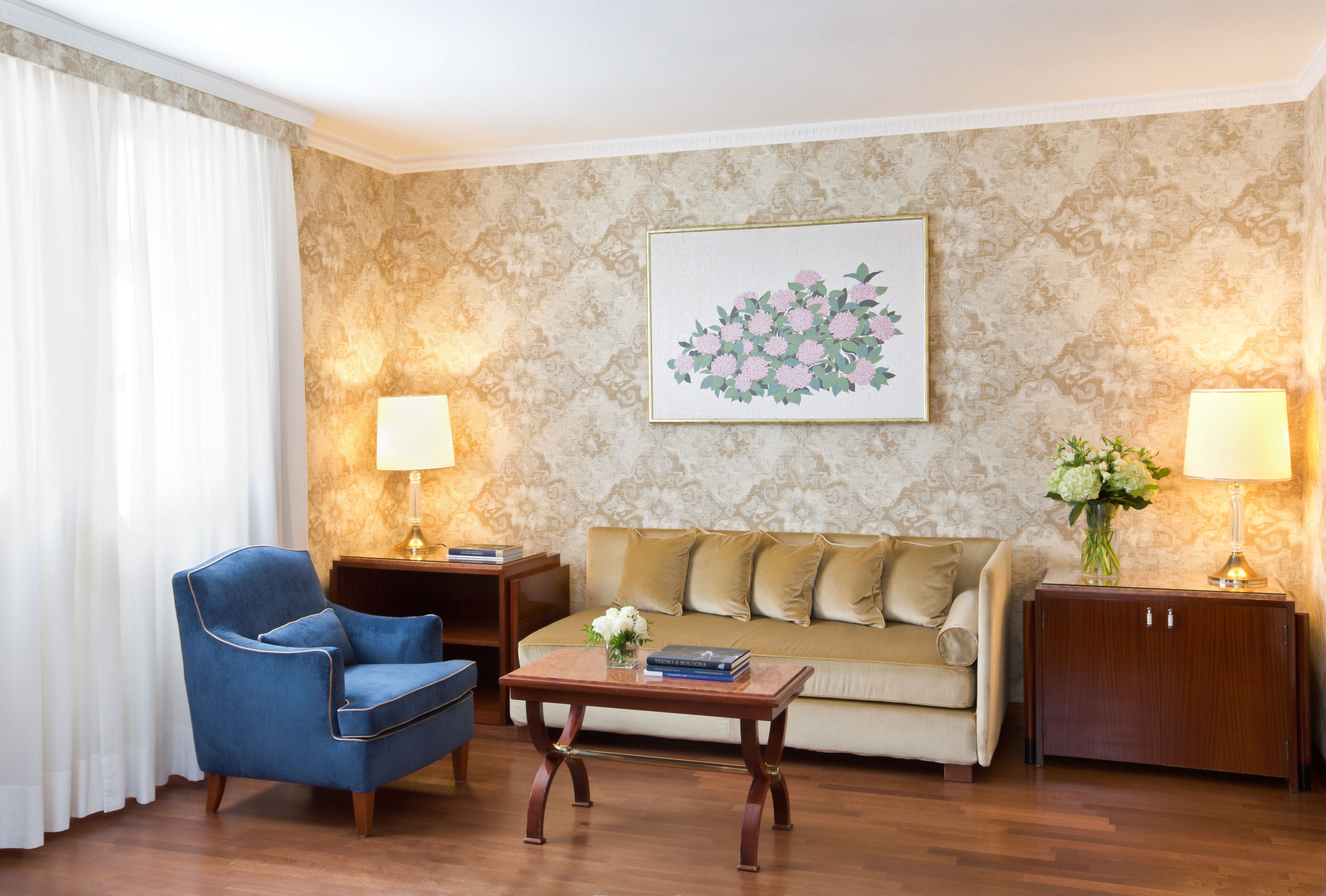 junior suite | living area | 26-inch tv with satellite channels, first-run films