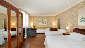 Family Room | Premium bedding, minibar, in-room safe, individually decorated