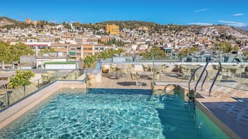 Seasonal outdoor pool, sun loungers