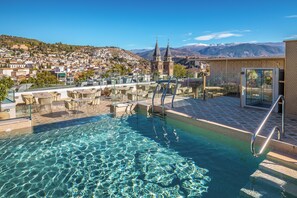 Seasonal outdoor pool, sun loungers