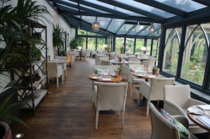 Lunch, dinner served; British cuisine, garden views 