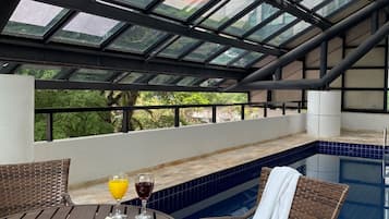 Indoor pool, open 7:00 AM to 10:00 PM, sun loungers