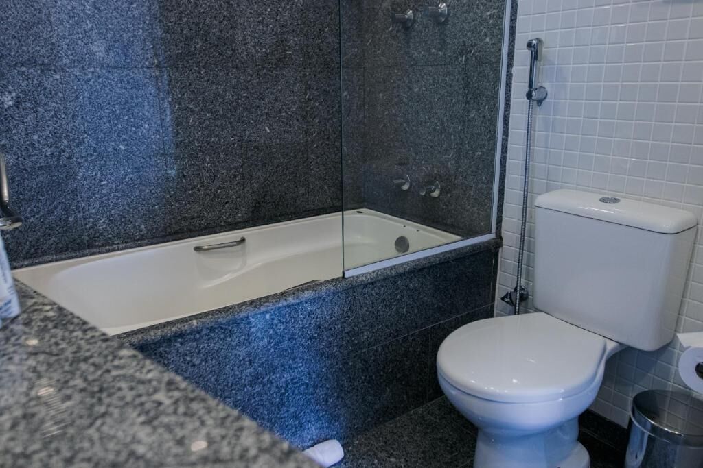premium double room | bathroom | shower, rainfall showerhead, free toiletries, hair dryer