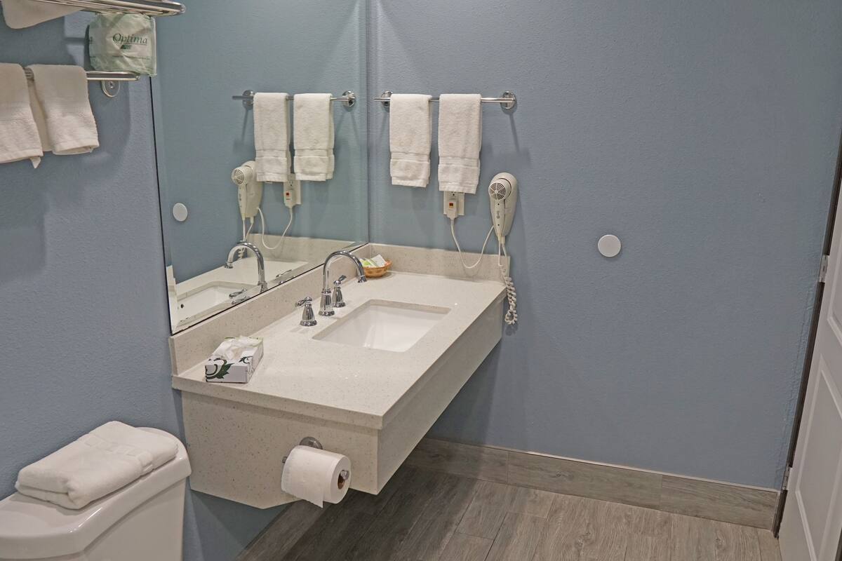 premium bedding, down duvets, pillow-top beds, blackout curtains