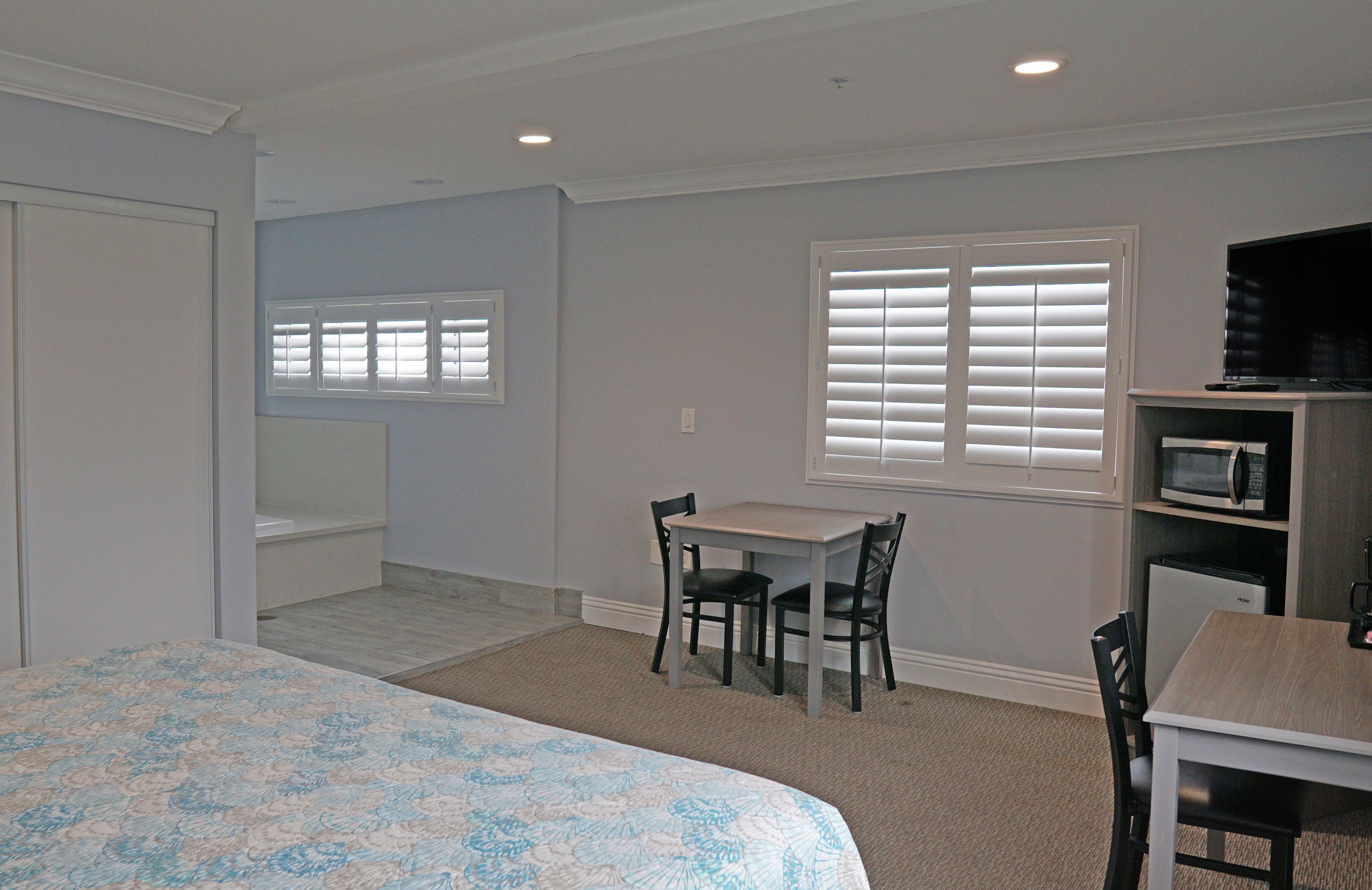 Standard Room, 1 King Bed, Jetted Tub, Harbor View | Premium bedding, down comforters, pillowtop beds, blackout drapes