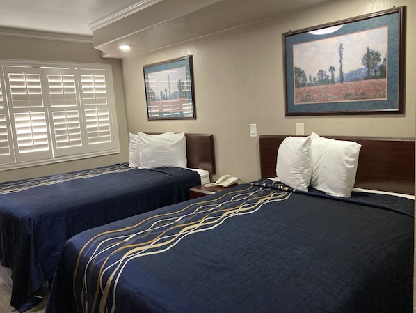 Standard Room, 2 Queen Beds | Down comforters, desk, soundproofing, iron/ironing board