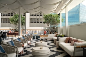 Outdoor pool, pool umbrellas, sun loungers
