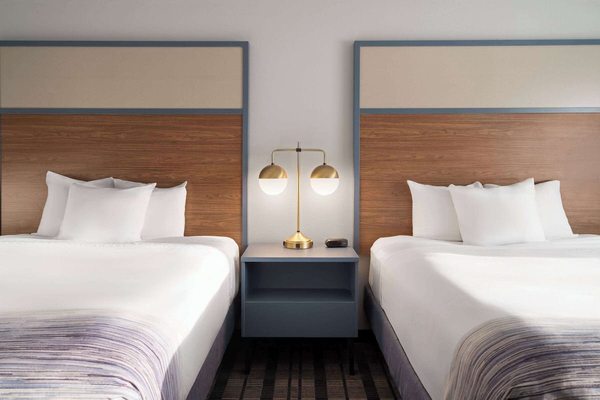 basic room, 2 queen beds, non smoking | 1 bedroom, in-room safe, laptop workspace, blackout curtains